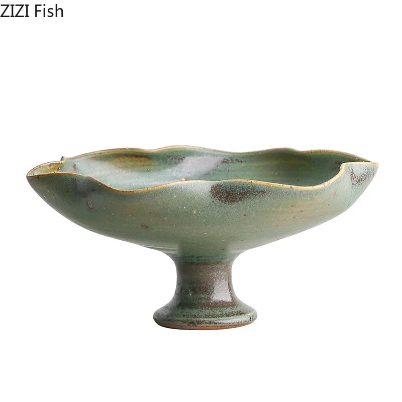 Green ceramic bowl with a textured surface on a white background